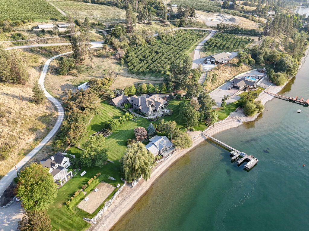 Aerial photo of a lakefront home and dock at 12056 Okanagan Centre Rd W, Lake Country