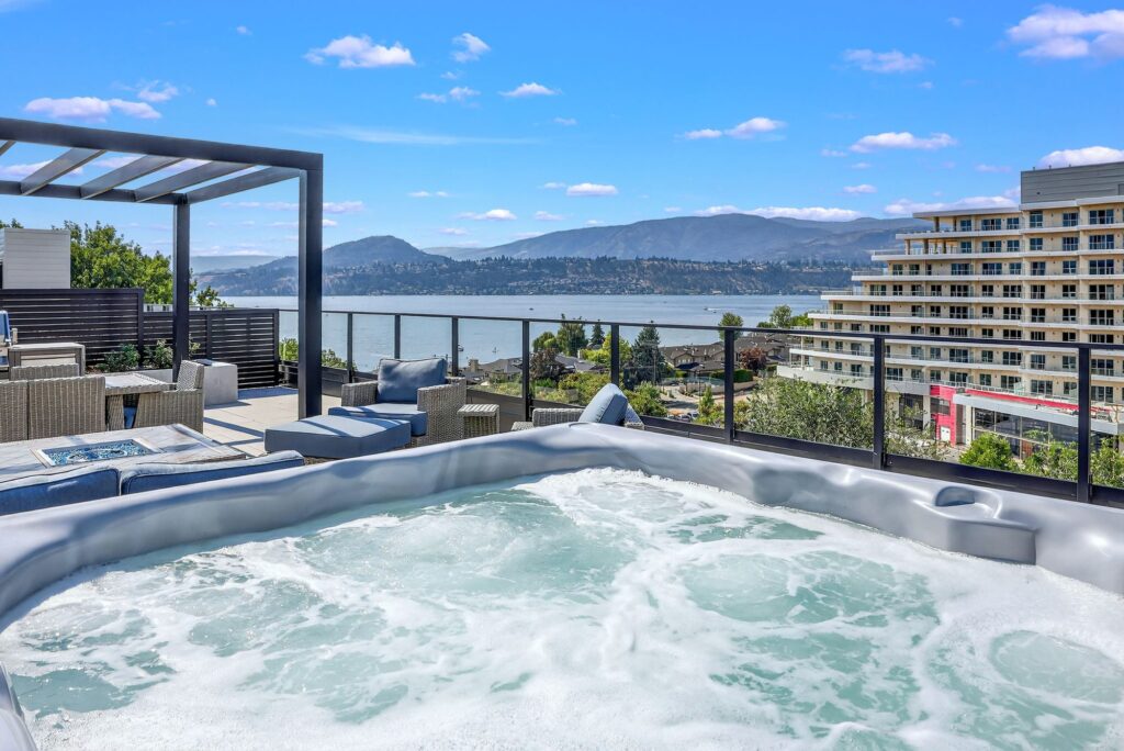 Hot tub on a condo patio overlooking Okanagan Lake